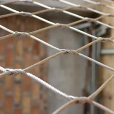 Сетка нержавеющая тросовая с параллельным узловым креплением и ромбической ячейкой Н6 7х7 AISI 304 20х35х1 мм